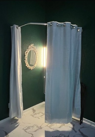 Behind the curtain
